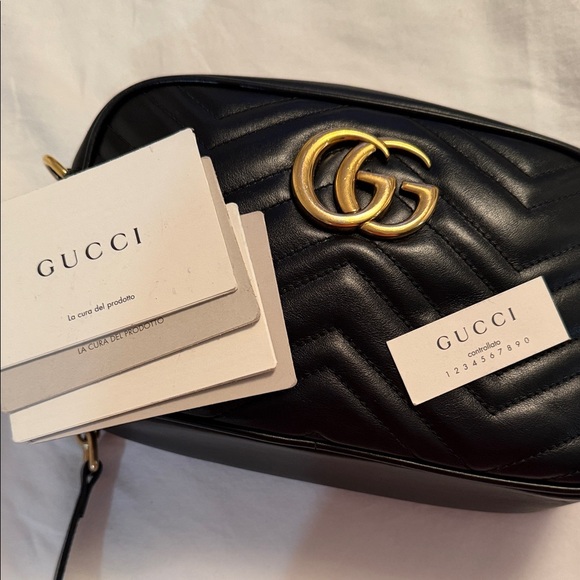 Gucci Handbags - Gucci Black Quilted Leather Camera Bag with Gold GG